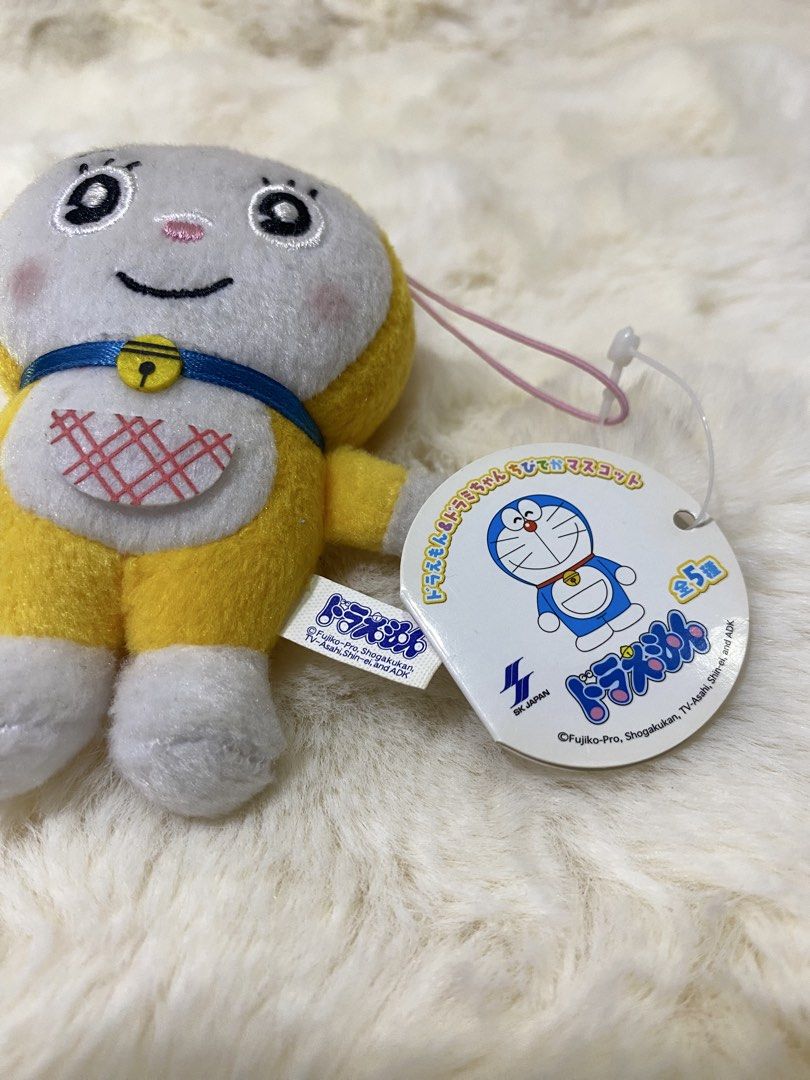 Doraemon Yellow Plush Toy with Red Bow (Category: Plushies & Soft Toys) located in Kalibo. Submitted by ollie_stuffshop (Listing ID 1450740403, Image 3). Description: Before you send your inquiries: ❗️Last Price is already posted ❗️Manage your expectations, WYSIWYG ❗️May need washing ❗️Shipping day is every Sunday - Adorable yellow Doraemon plush toy - Features a cute red bow on its head - Has a bell on its collar - Includes a special red heart d