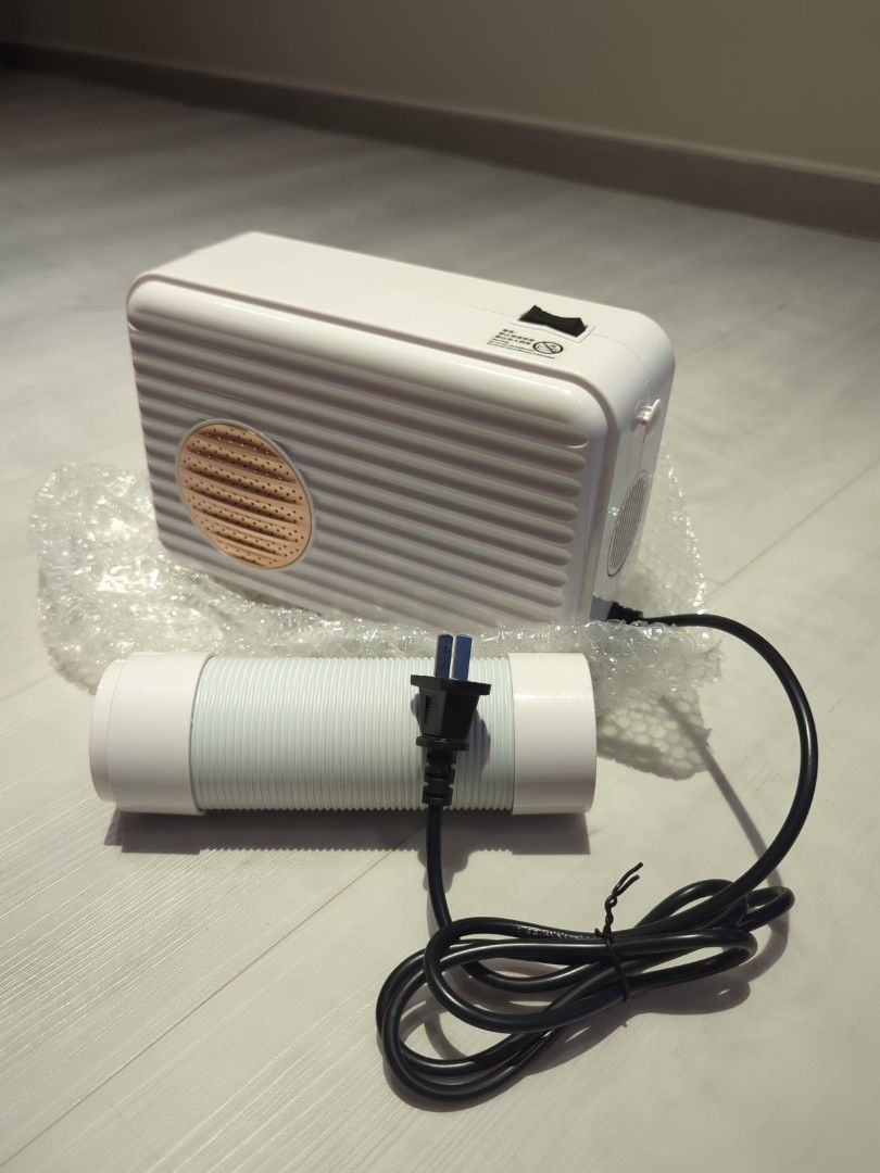 Drying Nursing Machine / multi-functional drying machine (Category: Home Improvement Tools & Accessories) located in Singapore. Submitted by whitewolf87 (Listing ID 1450869513, Image 1). Description: - Compact design with flexible hose - Functions: Fast drying, odor removal - Ensures items are clean and dry brand new, reason for sell: find myself never use it, originally bought to dry filament for 3D printer but ended up never set it up after bou