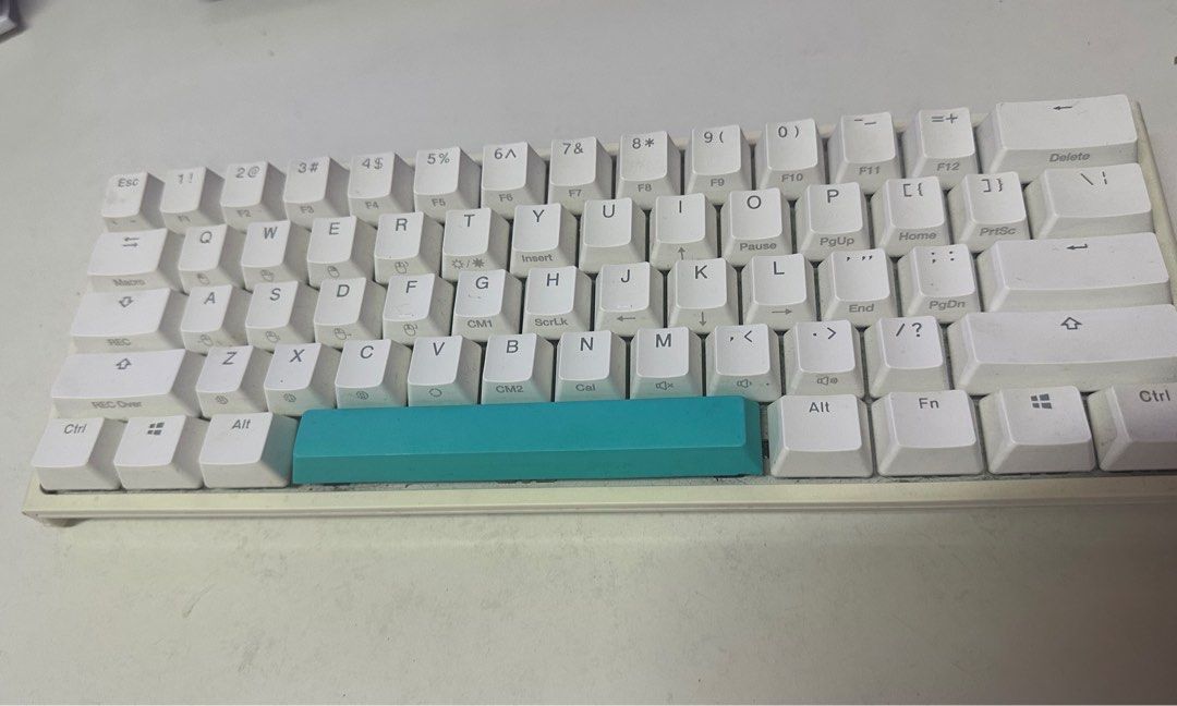 Ducky One 2 Mini Mechanical Keyboard White (Category: Computer Keyboard) located in Quezon City. Submitted by shensen_ (Listing ID 1450750588, Image 1). Description: - Ducky One 2 Mini Keyboard - White case with a unique teal spacebar - Compact 60% layout, perfect for saving desk space - Backlit keys for enhanced visibility - Ideal for both gaming and typing enthusiasts - Tested and fully functional - Minor signs of use on the case, as expected w