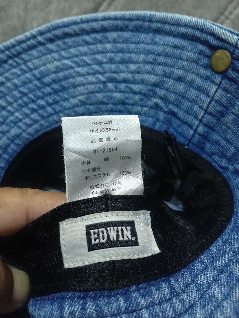 EDWIN Denim Bucket Hat Size 58cm (Category: Cap & Hats) located in Kuantan. Submitted by jrootbundle (Listing ID 1450907973, Image 3). Description: - EDWIN denim bucket hat - Size: 57-58cm - Adjustable drawstring for a secure fit - Ideal for sunny weather - Material: 100% Cotton - Made in Vietnam.