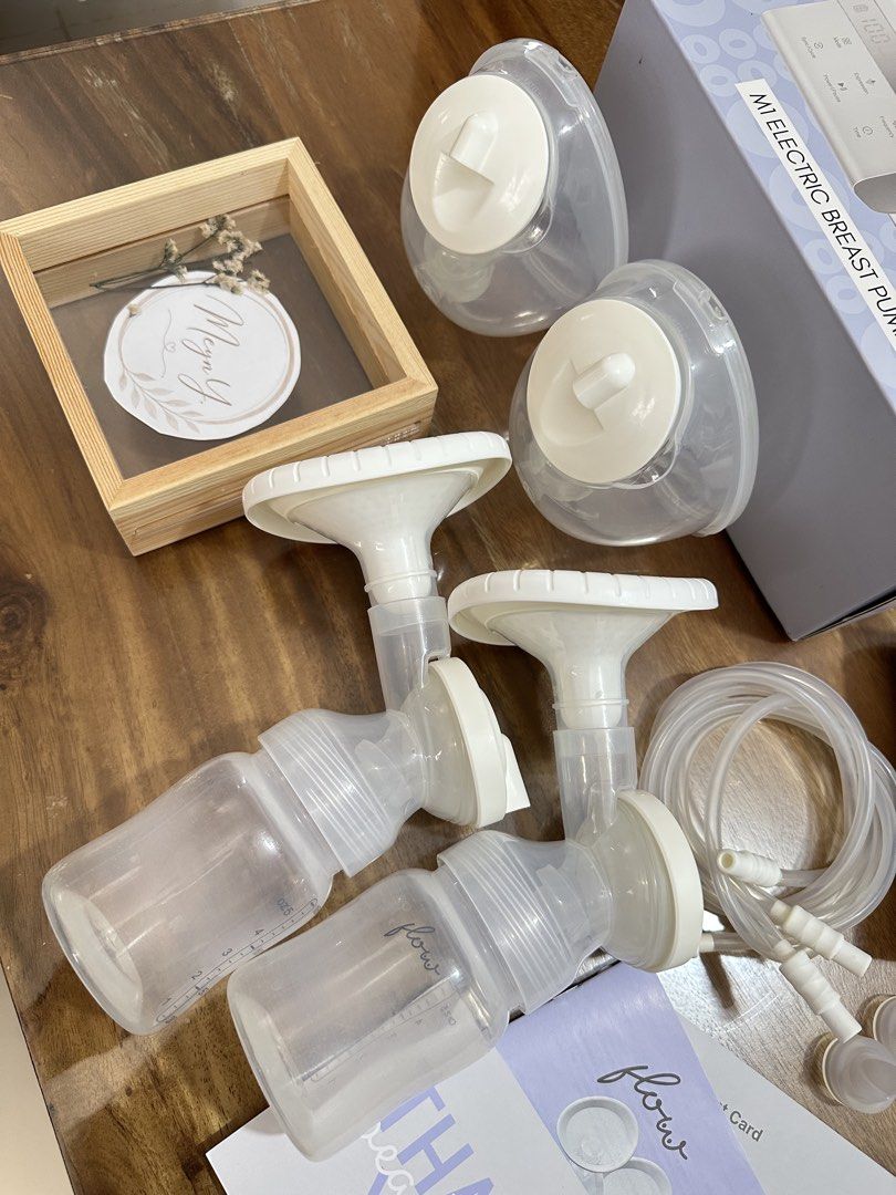 Flow M1 Electric Breast Pump 2 in 1 with freebies (Category: Breastfeeding & Bottle Feeding) located in Manila. Submitted by meynyee (Listing ID 1450759035, Image 2). Description: Selling my preloved Flow M1 2-in-1 Double Electric Hospital Grade Breast Pump. Condition: * ✅ Fully functional and working well * ✅ Complete set * ⚠️ Has slight discoloration on some parts due to UV sterilization. * ⚠️ May have minimal scratches from normal use. Complet