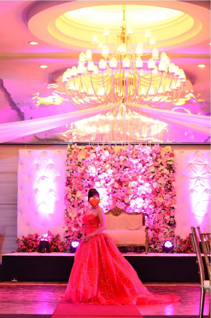 FOR RENT: Debut Red Ball Gown (Category: Evening dresses & gowns) located in Rizal. Submitted by miyabutternut21 (Listing ID 1450796930, Image 2). Description: - Strapless red ball gown - Intricate gold embroidery and glitter details - Full, voluminous skirt with a train - Ideal for formal events, pageants, or themed parties - Worn only once - Ready for your next grand occasion 500 deposit refundable.
