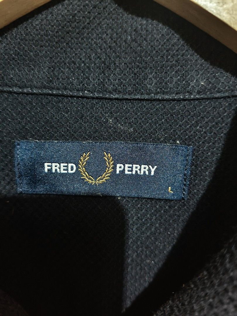 Fred Perry (Category: Activewear) located in Mandaue City. Submitted by prekfinds (Listing ID 1450870473, Image 3). Description: Fred Perry Buttondown polo shirt Excellentcondition 9.9/10colorate Size:Large on tag Dimes:23W x 27L Issue: cut wash tag but Legit No other issue No major flaws.