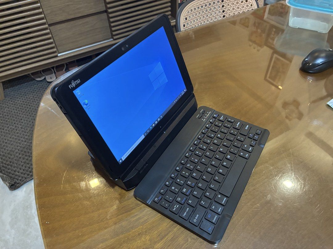 Fujitsu Tablet 2-in-1 Laptop with Keyboard and Mouse (Category: Laptops & Notebooks) located in Abucay. Submitted by fliptopsph (Listing ID 1450898546, Image 2). Description: 💻 Fujitsu ARROWS Tab Q507 – 2-in-1 Windows Tablet | Touchscreen | Portable & Reliable 2 Units Available Specifications: • Intel Atom x5 • 4GB RAM • 64GB eMMC Storage • 10.1-inch WUXGA (1920×1200) IPS Touchscreen Display • Intel HD Graphics • Windows 10 Pro / Windows 11 Comp