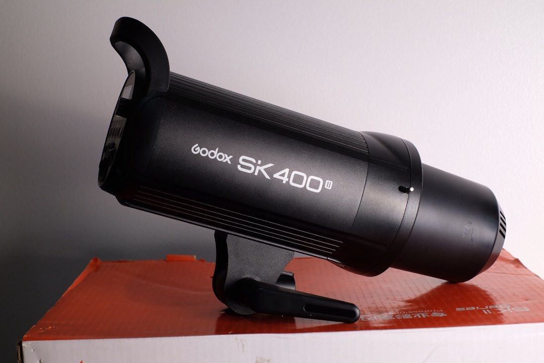 Godox SK400II Studio Strobe Flash Light (Category: Lighting & Studio Equipment) located in Manila. Submitted by forsalebyalps (Listing ID 1450907312, Image 3). Description: - Godox SK400II Studio Flash - Professional lighting for studio photography - 400Ws power output - Adjustable flash intensity (5.0 to 7.0) - 150W modeling lamp - Built-in Godox 2.4G wireless X system - High performance and durability FREE GODOX X2T Wireless Trigger.