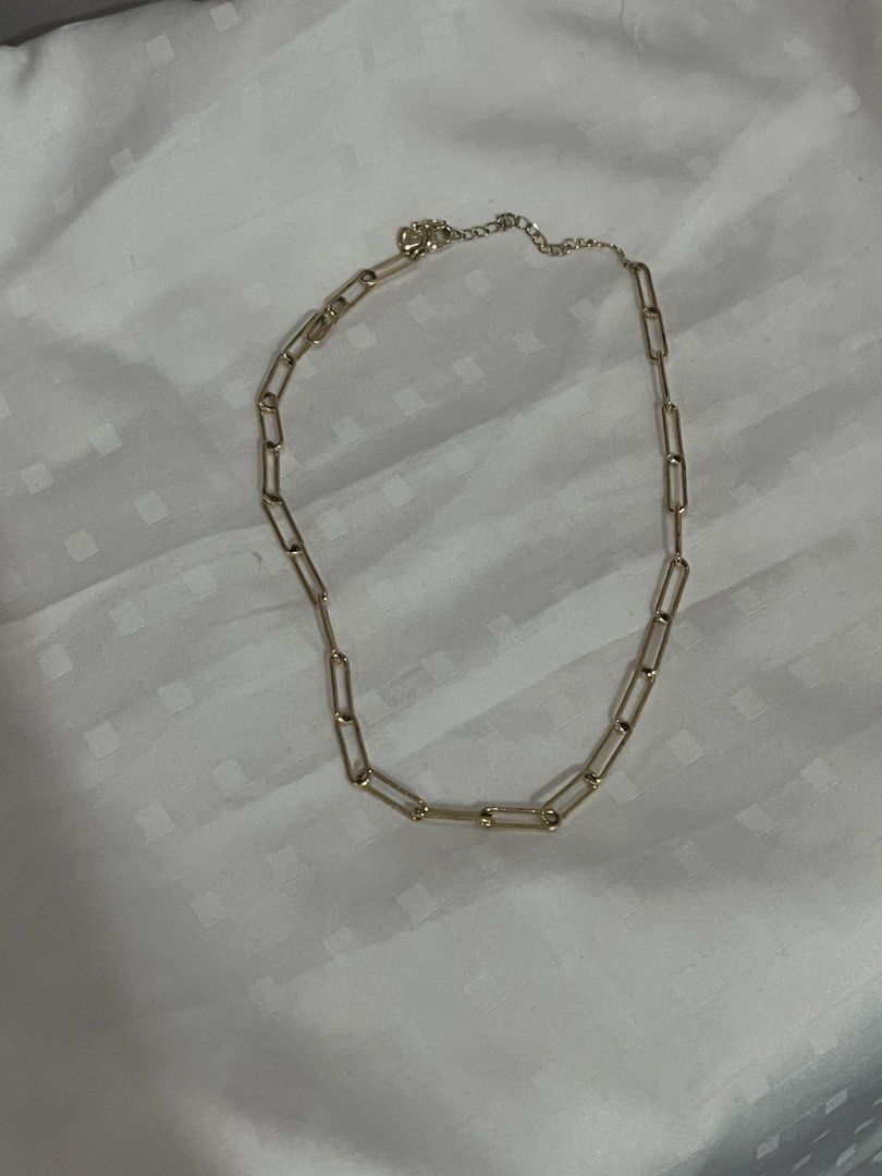 Gold Paperclip Chain Necklace (Category: Necklaces) located in Manila. Submitted by mxinii (Listing ID 1450867978, Image 1). Description: - Simple gold paperclip chain necklace - Great for layering or wearing solo - Adjustable clasp for a comfortable fit.