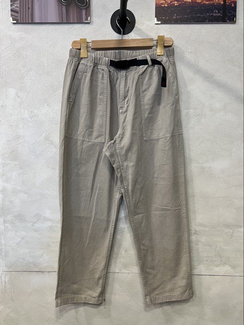 Gramicci Elasticsted Belt Trousers (Category: Trousers) located in Manila. Submitted by -handpick- (Listing ID 1450807237, Image 2). Description: These beige Gramicci trousers are defined by their adjustable webbing belt and functional elasticated waistband. Size : Small Dimensions : Length : 34 Inseam : 24 Leg opening : 7.5 Knee : 10 Thigh : 13 Front rise :14 Waistline : 28,30 .