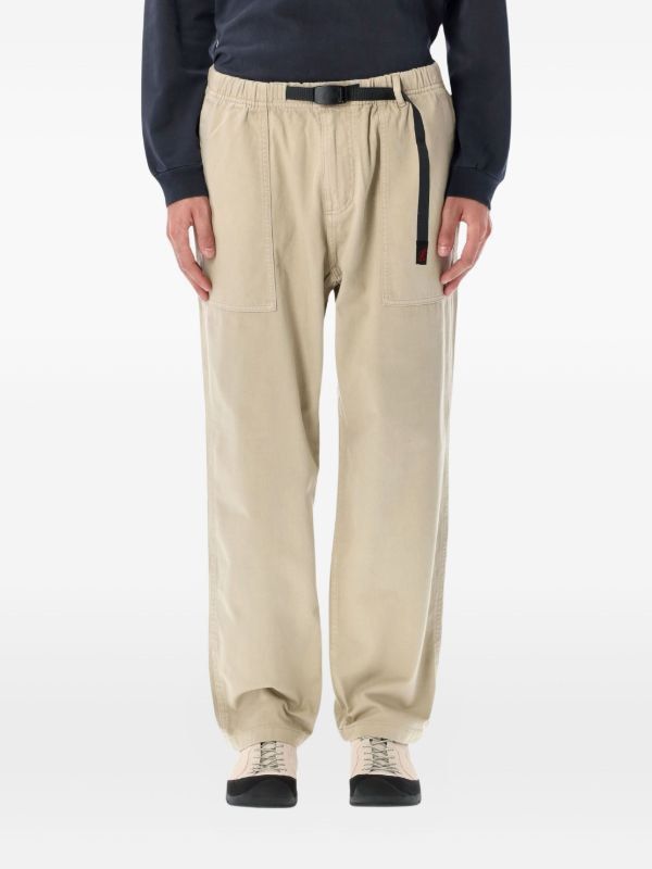 Gramicci Elasticsted Belt Trousers (Category: Trousers) located in Manila. Submitted by -handpick- (Listing ID 1450807237, Image 1). Description: These beige Gramicci trousers are defined by their adjustable webbing belt and functional elasticated waistband. Size : Small Dimensions : Length : 34 Inseam : 24 Leg opening : 7.5 Knee : 10 Thigh : 13 Front rise :14 Waistline : 28,30 .