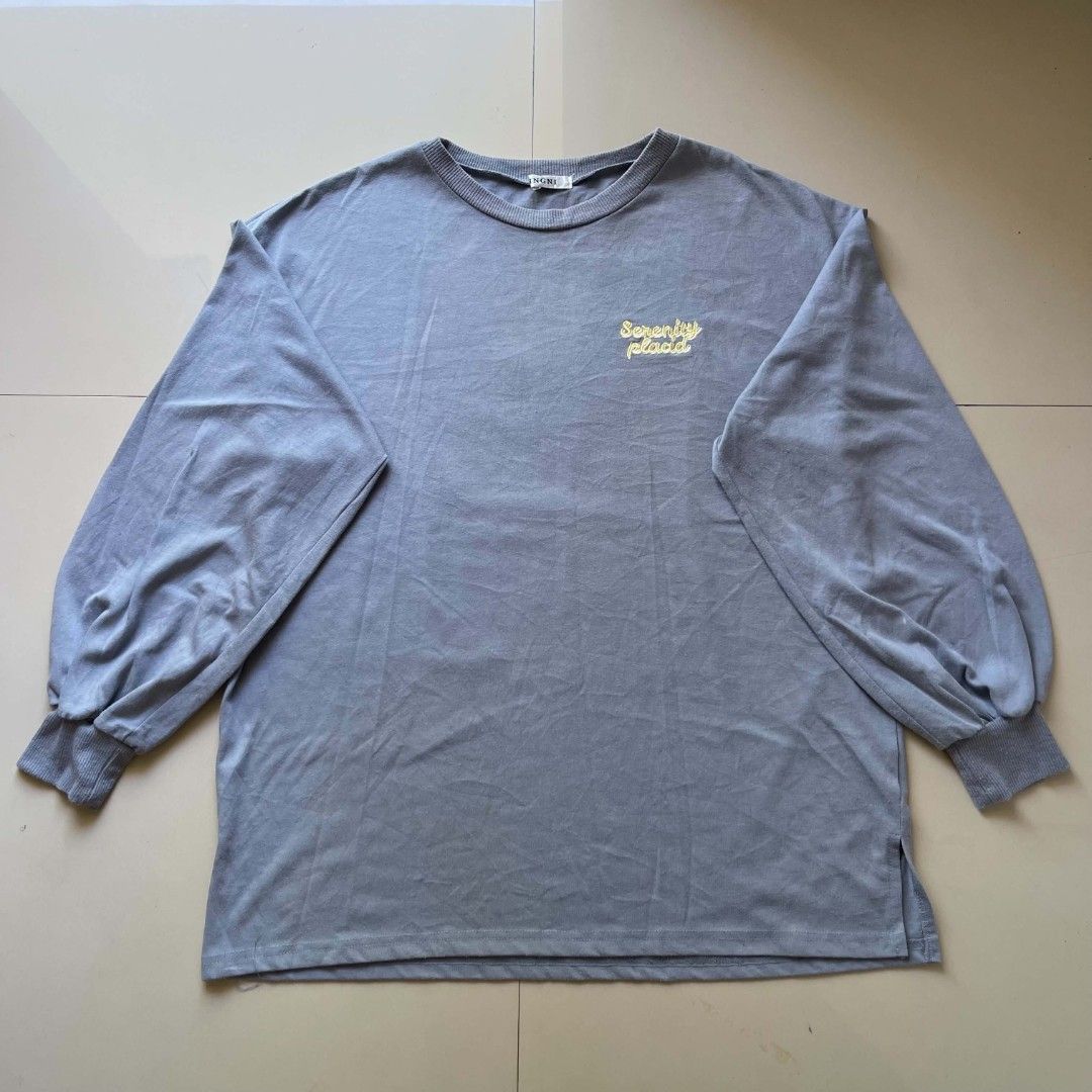 Grey Long Sleeve Shirt with "Somewhere Else" Graphic (Category: Tshirts & Polo Shirts ) located in Manila. Submitted by daemon10 (Listing ID 1450850642, Image 1). Description: - Grey long-sleeved shirt - Crew neck - Small yellow "Somewhere Else" graphic on chest - Voluminous sleeves with elasticated cuffs - Side slits at the hem - Comfy and casual style.