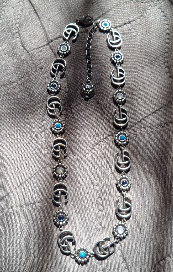Gucci Double G Flower Necklace (Category: Necklaces) located in Pasay City. Submitted by 4lesstuff (Listing ID 1445046929, Image 1). Description: silver-tone Gucci Interspersed with floral charms not sure for authentication no shown of engraved selling low price .