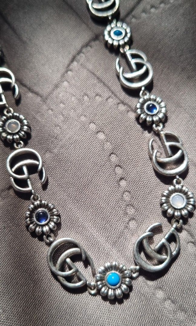 Gucci Double G Flower Necklace (Category: Necklaces) located in Pasay City. Submitted by 4lesstuff (Listing ID 1445046929, Image 2). Description: silver-tone Gucci Interspersed with floral charms not sure for authentication no shown of engraved selling low price .
