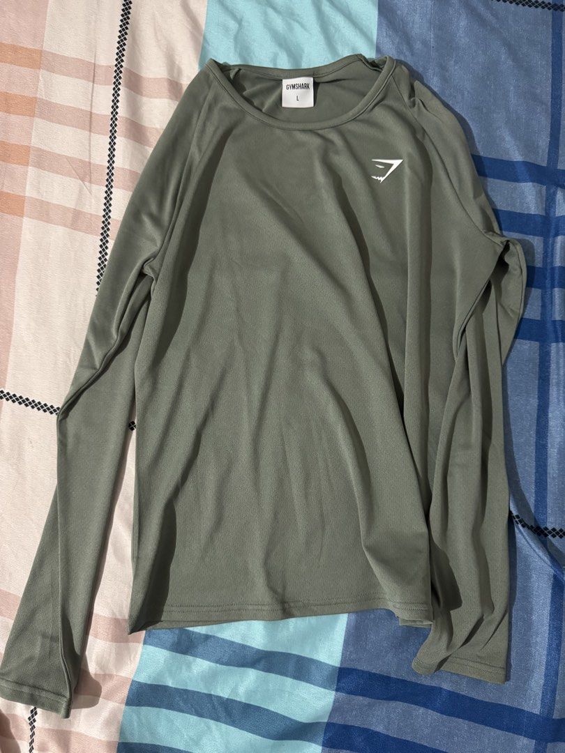 Gymshark training longsleeve (Category: Activewear) located in Manila. Submitted by angool (Listing ID 1450836325, Image 3). Description: No LOW BALLER‼️ * Purchased directly from the app * Discount available when purchasing 3 or more items * Fits large REGULAR FIT * Will provide receipt proof of authenticity.