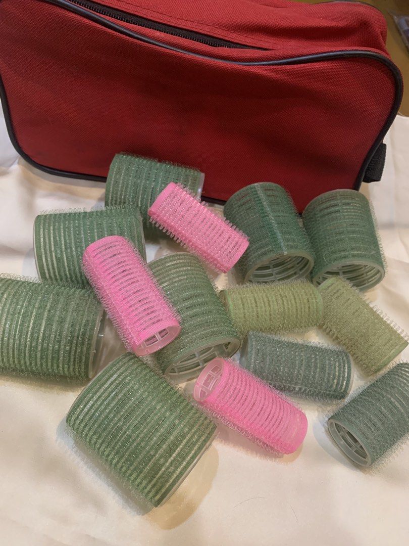 Hair Rollers Set with Red Storage Bag (Category: Hair) located in Manila. Submitted by gracefilledshop (Listing ID 1450757153, Image 1). Description: - Free if you buy P700 from my listings. - Achieve beautiful hairstyles at home with this versatile hair roller set. - Comes with a convenient red storage bag that zips up securely. - Includes a variety of green and pink rollers in different sizes for all your styling needs. - Easy to store and perf