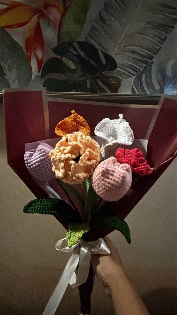 Handmade Crocheted Flower Bouquet - Unique Gift (Category: Flowers & Bouquets) located in Manila. Submitted by candygurl18 (Listing ID 1450827725, Image 2). Description: Beautiful handmade crocheted flower bouquet. Features a mix of colorful flowers like tulips and calla lilies. Wrapped in dark red and brown paper with a white ribbon tie. Great as a gift or for home decor. No two bouquets are exactly alike. Each flower is carefully crafted..