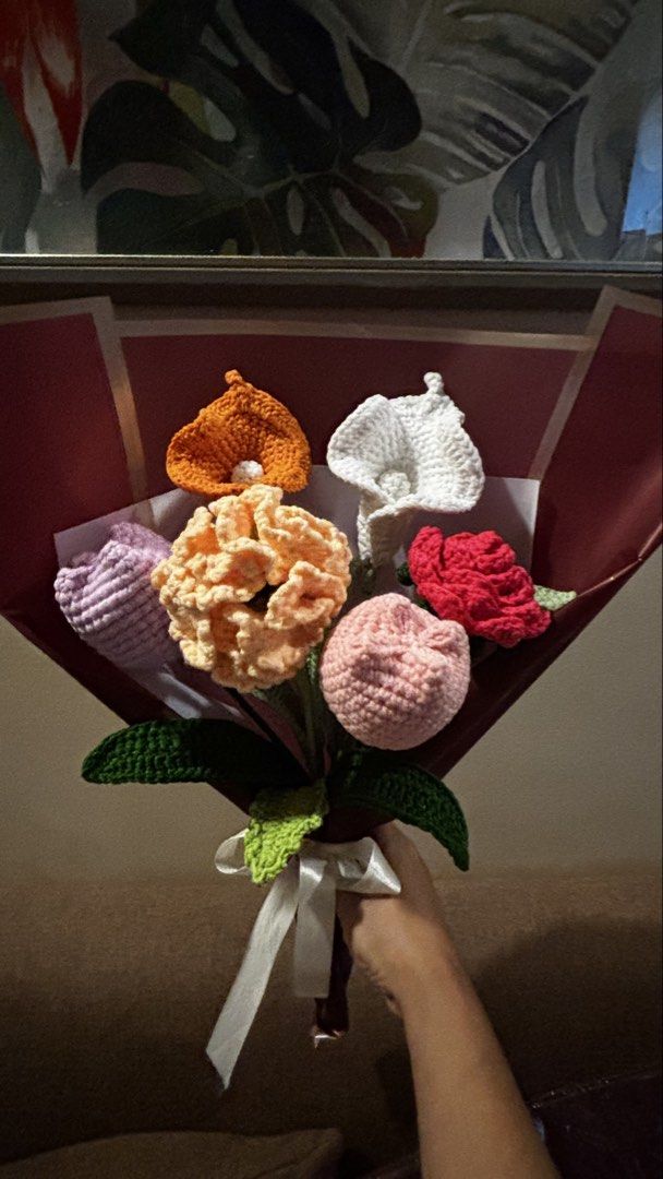 Handmade Crocheted Flower Bouquet - Unique Gift (Category: Flowers & Bouquets) located in Manila. Submitted by candygurl18 (Listing ID 1450827725, Image 3). Description: Beautiful handmade crocheted flower bouquet. Features a mix of colorful flowers like tulips and calla lilies. Wrapped in dark red and brown paper with a white ribbon tie. Great as a gift or for home decor. No two bouquets are exactly alike. Each flower is carefully crafted..