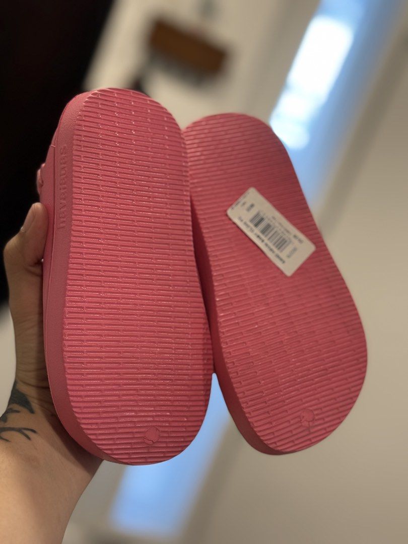 Havaianas Baby Clogs ( CYBER PINK ) (Category: Babies & Kids Fashion) located in General Trias. Submitted by mzdi4nne (Listing ID 1450817262, Image 3). Description: SIZE: 9C BRAND NEW - Pink Havaianas sandals for kids - Features a secure back strap - Easy to slip on and off - Ideal for beach trips or daily wear - Comfortable and durable construction - Perfect for active little feet.