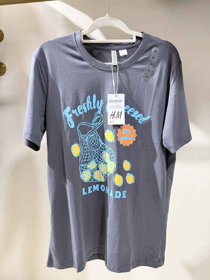 H&M Divided Graphic T-Shirts (Size M & L) (Category: Shirts) located in San Fernando. Submitted by mci.ph (Listing ID 1450836342, Image 2). Description: Selling a bundle of H&M Divided graphic tees. Features fun fruit and beverage-themed prints. Great for casual wear. All are size M or L. Some have tags still attached. Grab these comfy tees for your wardrobe!.