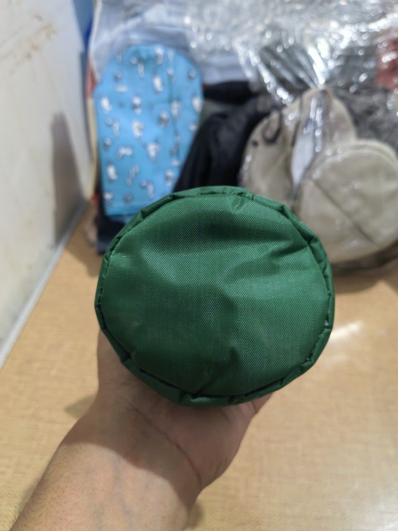 Insulated Waterbottle Pouch Holder. (Category: Other Kitchenware & Tableware) located in Cebu City. Submitted by dudes_villanueva (Listing ID 1450772795, Image 3). Description: Insulated Waterbottle Pouch Holder. Brand: Kinokuniya 📌 In excellent condition. Height: 9.5 in Diameter: 3 in.