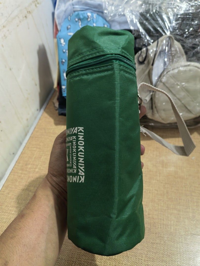 Insulated Waterbottle Pouch Holder. (Category: Other Kitchenware & Tableware) located in Cebu City. Submitted by dudes_villanueva (Listing ID 1450772795, Image 2). Description: Insulated Waterbottle Pouch Holder. Brand: Kinokuniya 📌 In excellent condition. Height: 9.5 in Diameter: 3 in.