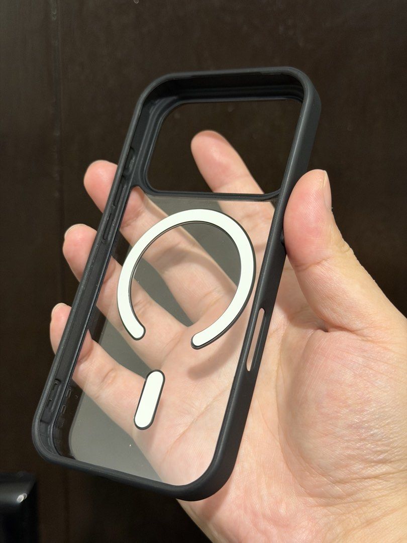 iPhone 17 Pro (NOT MAX) Magnetic Magsafe Black Clear Case (Category: Cases & Sleeves) located in Quezon City. Submitted by dreeeeeeee (Listing ID 1450862337, Image 2). Description: * Still in good condition - may signs of usage lang like hairline scratches sa clear plastic part * Near LRT 2 Gilmore Station (condo lobby) po for Lalamove, Grab, or pickup .