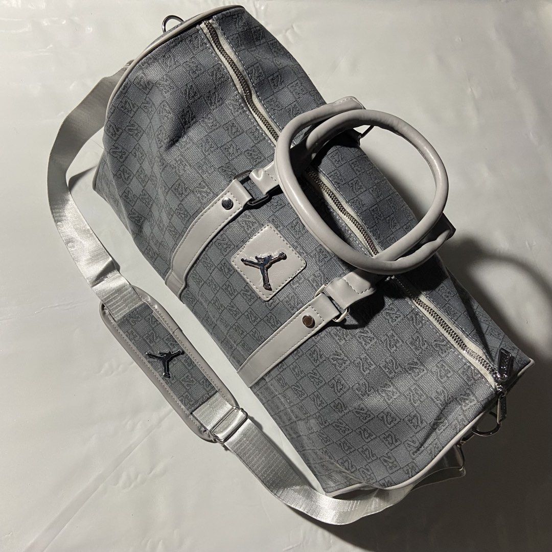 Jordan Monogram Duffle Bag ( Grey ) (Category: Luxury Bags & Wallets) located in Manila. Submitted by tepthirft (Listing ID 1450807321, Image 2). Description: Jordan Monogram Duffle Bag ( Grey ) Excellent condition ~no issue Open For Claim📥.