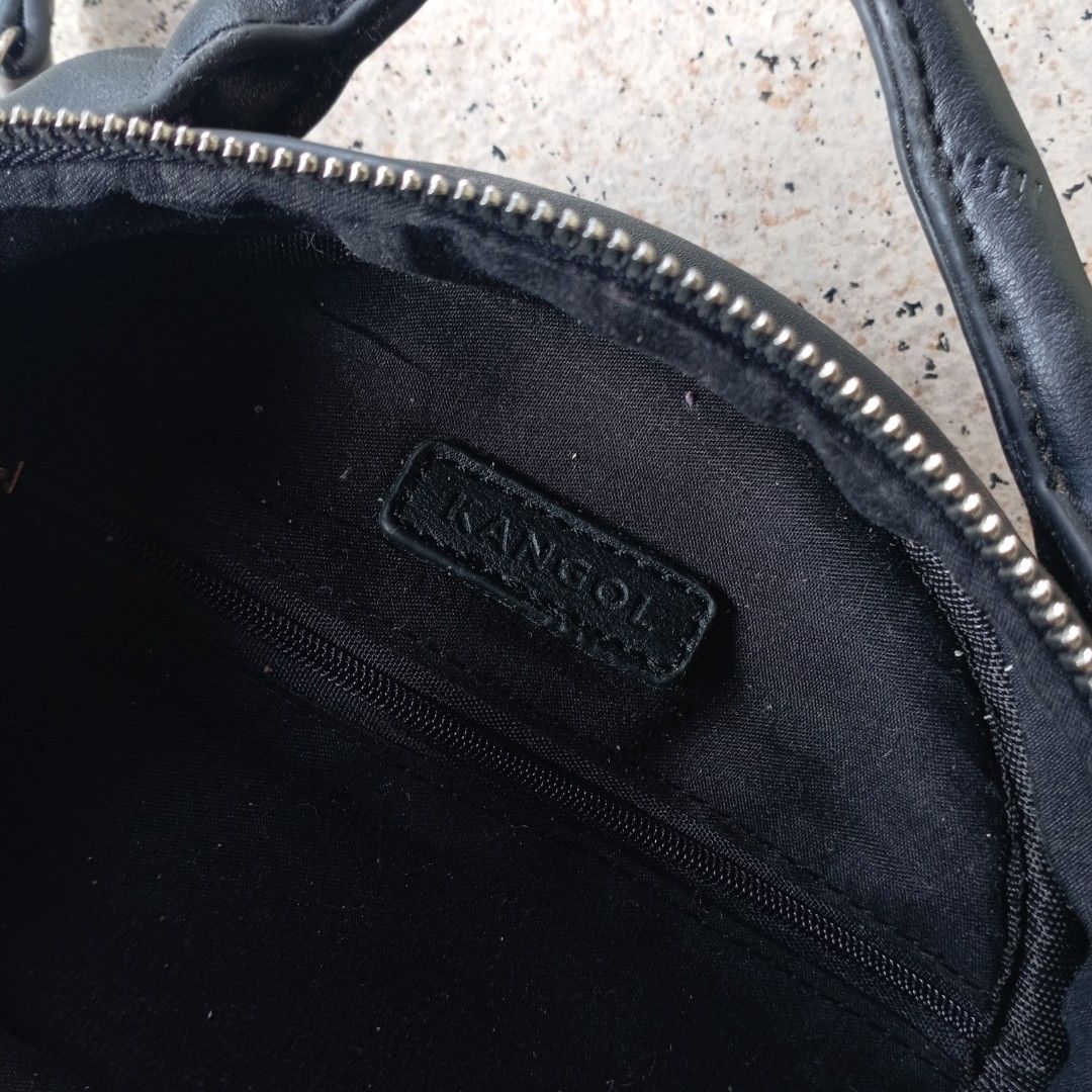 Kangol Round Sling Bag with Tassel (Category: Cross-body Bags) located in Maramag. Submitted by kenthrift_ (Listing ID 1450751563, Image 3). Description: Kangol Round Sling Bag with Tassel •Excellent condition •Issue: Naipit sa likod, check last photo.