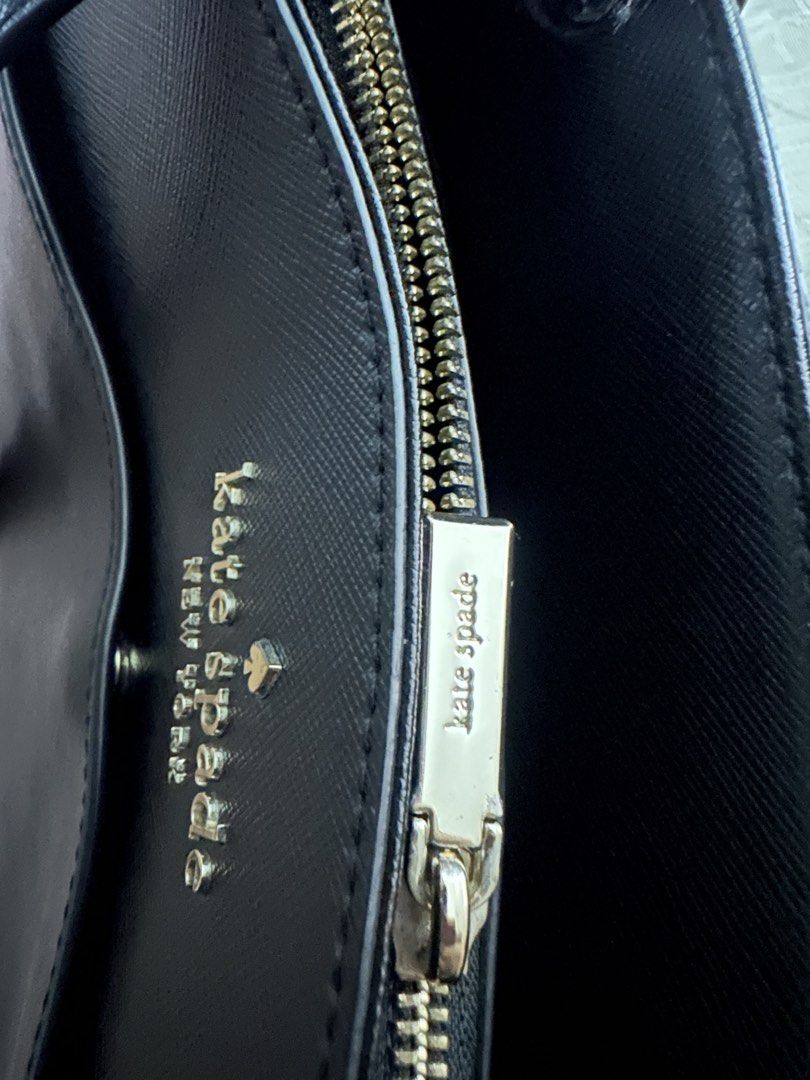 Kate spade Bag (Category: Luxury Bags & Wallets) located in Quezon City. Submitted by rose_017 (Listing ID 1450857784, Image 3). Description: 🖤 Original Kate Spade New York Large Tote Bag 💰 Price: ₱1,800 negotiable ✨ 100% Authentic Kate Spade New York * Premium saffiano leather * Classic black color * Silver-tone hardware * Spacious interior – perfect for work, office, travel, or everyday use * Clean interior with smooth zipper * Includes origi
