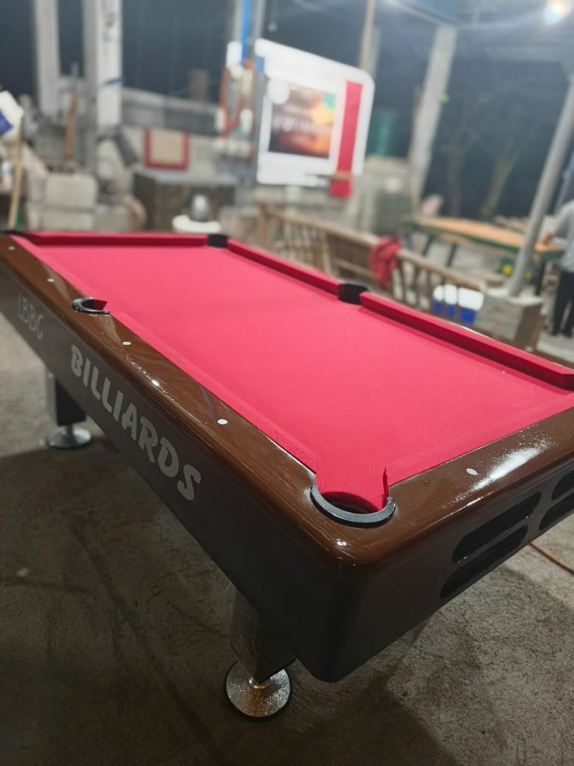 King Billiards Pool Table with Accessories (Category: Billiards and Bowling) located in Caloocan City. Submitted by markdiethe08217 (Listing ID 1450785626, Image 2). Description: - King Billiards Pool Table - Includes cues and balls - Sturdy wooden frame with black legs - Ideal for game rooms and entertainment areas - Ready for pickup.