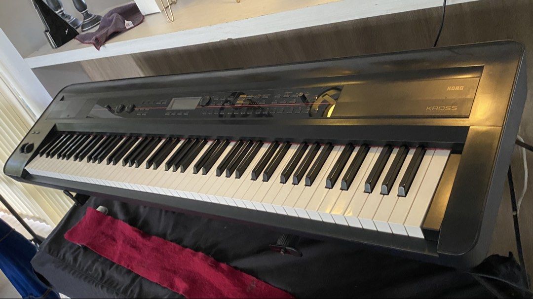KORG KROSS Synthesizer Keyboard (Category: Musical Instruments) located in Silang. Submitted by ddeclutterproject (Listing ID 1450779309, Image 2). Description: - KORG KROSS 88-key synthesizer keyboard - Ideal for music production and live performances - Battery compartment visible in photos - keys are in excellent working condition -light scratches -LCD: some lines are missing but very much readable -buttons are hard to the touch but responsive 