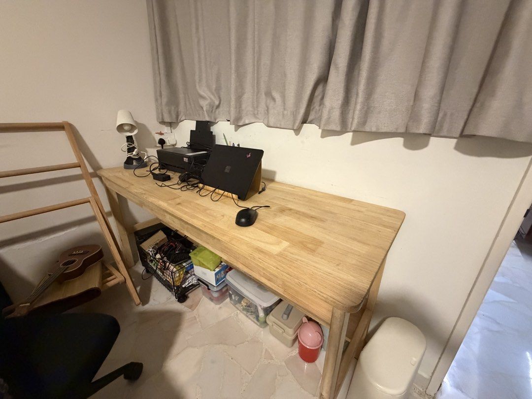 Long Study Table (Category: Tables & Sets) located in Singapore. Submitted by amy.l (Listing ID 1450882379, Image 1). Description: - Long study table with a natural wood finish - Spacious tabletop provides ample workspace - Sturdy and durable construction - Minimalist and functional design - Dismantling required for transport Long study table that fits 2 pax See measurements in last photo, does not come with chairs.