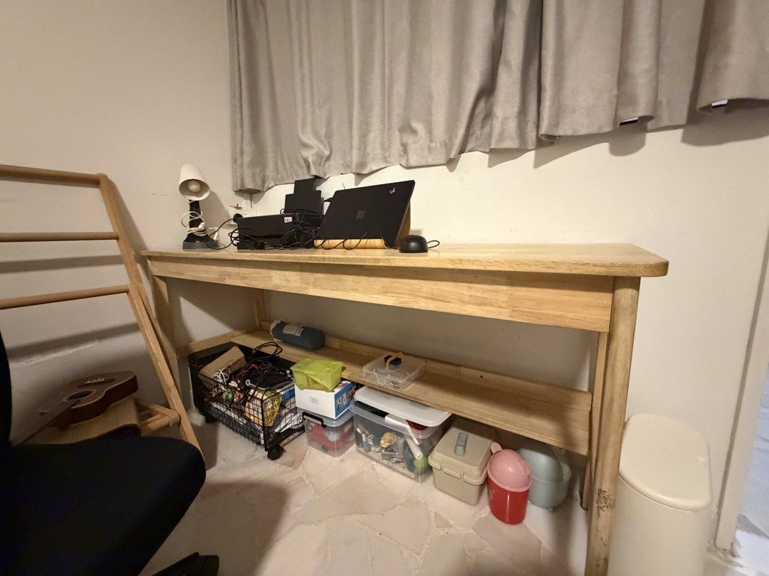 Long Study Table (Category: Tables & Sets) located in Singapore. Submitted by amy.l (Listing ID 1450882379, Image 2). Description: - Long study table with a natural wood finish - Spacious tabletop provides ample workspace - Sturdy and durable construction - Minimalist and functional design - Dismantling required for transport Long study table that fits 2 pax See measurements in last photo, does not come with chairs.