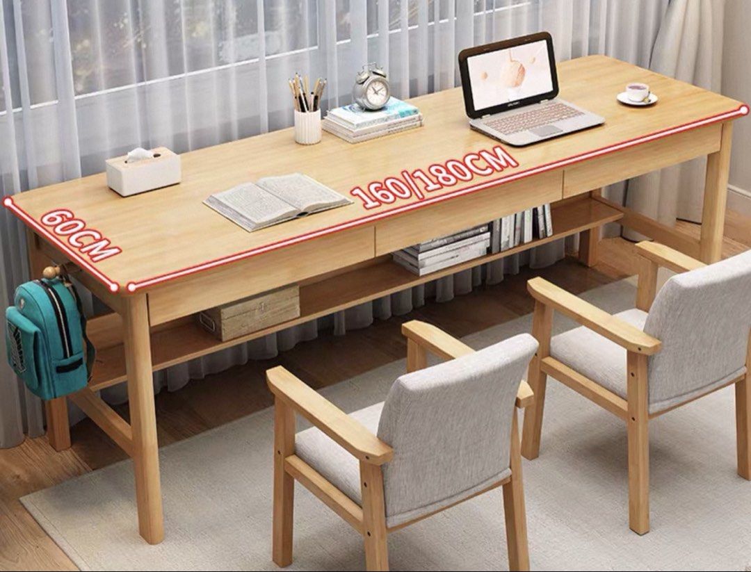 Long Study Table (Category: Tables & Sets) located in Singapore. Submitted by amy.l (Listing ID 1450882379, Image 3). Description: - Long study table with a natural wood finish - Spacious tabletop provides ample workspace - Sturdy and durable construction - Minimalist and functional design - Dismantling required for transport Long study table that fits 2 pax See measurements in last photo, does not come with chairs.