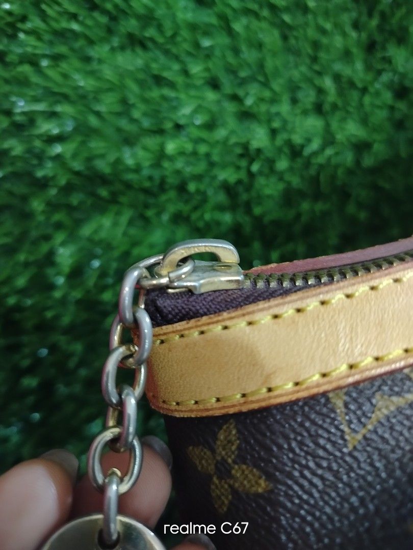 Louis Vuitton Monogram Tivoli (Category: Luxury Bags & Wallets) located in Bacolod City. Submitted by Mike23MattPreloved (Listing ID 1450823785, Image 3). Description: - Classic Louis Vuitton Speedy bag - Monogram canvas with vachetta leather trim and handles - Secure zipper closure with a cute charm - Spacious interior for essentials - Timeless and perfect for everyday use.
