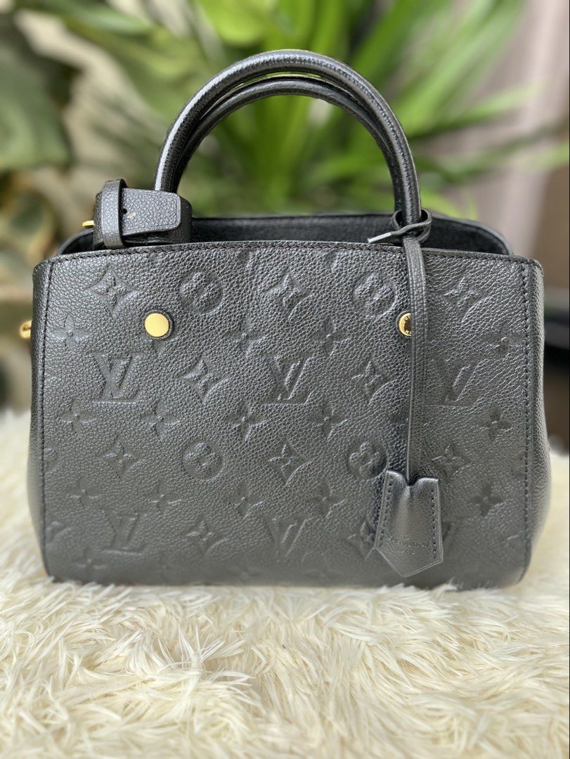 Louis Vuitton Montaigne BB in Black Empreinte Leather (Category: Luxury Bags & Wallets) located in Cagayan de Oro. Submitted by orocurations (Listing ID 1450794264, Image 1). Description: - This is a Louis Vuitton Montaigne BB handbag crafted from black Monogram Empreinte leather, featuring signature embossed monogramming and sleek gold hardware. - Inclusions: detachable shoulder/crossbody strap, leather clochette, two keys, LV padlock, original 