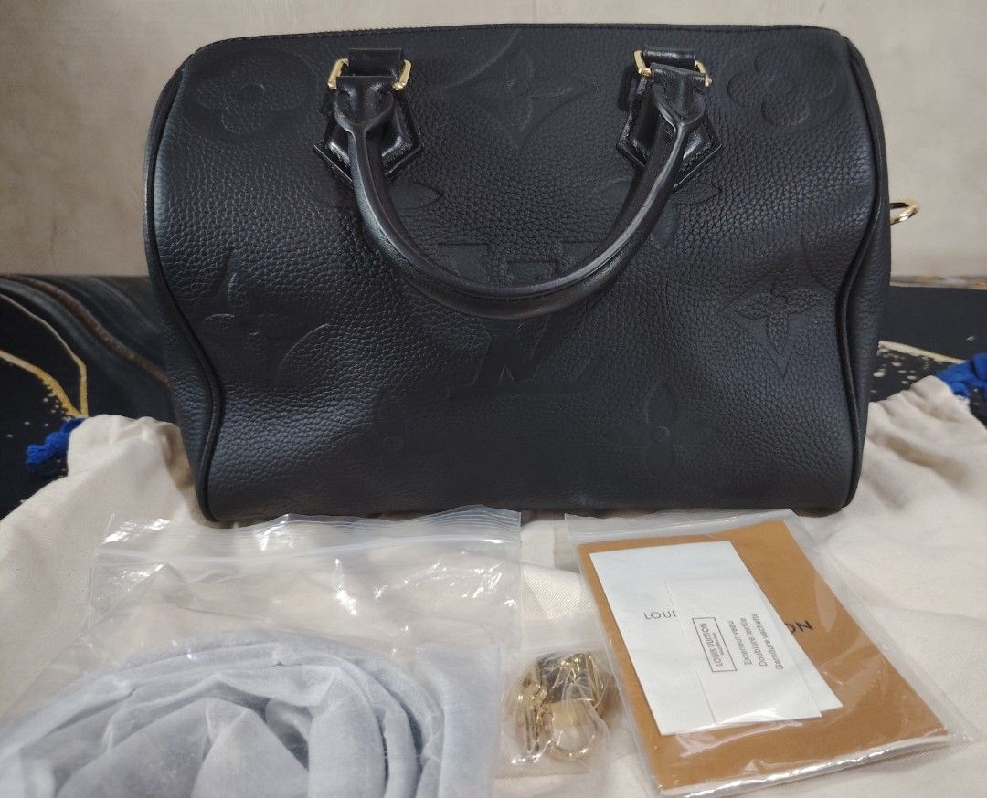 Louis Vuitton Speedy Black Monogram Empreinte Leather Handbag (Category: Luxury Bags & Wallets) located in Manila. Submitted by kriziealix123 (Listing ID 1450830572, Image 1). Description: GOOD CONDITION COMPLETE INCLSION NO BOX.