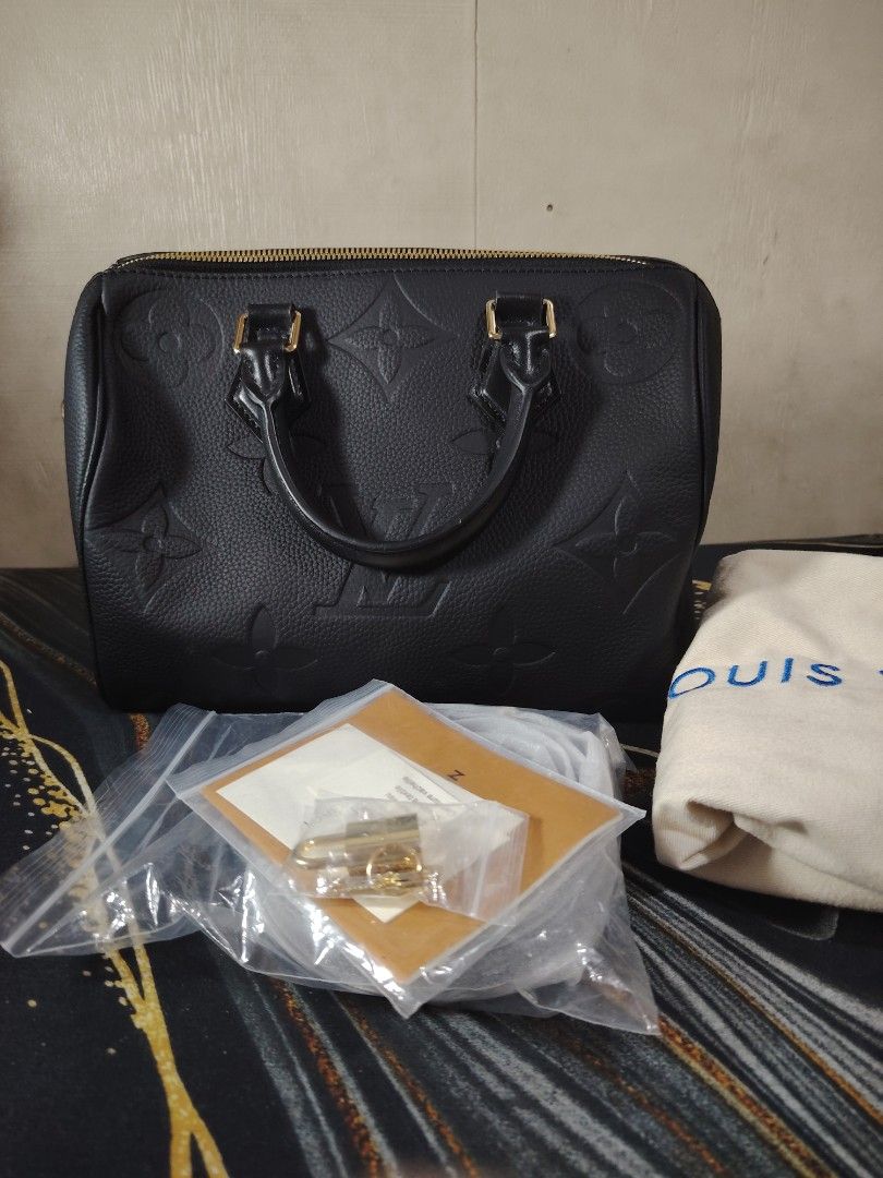 Louis Vuitton Speedy Black Monogram Empreinte Leather Handbag (Category: Luxury Bags & Wallets) located in Manila. Submitted by kriziealix123 (Listing ID 1450830572, Image 2). Description: GOOD CONDITION COMPLETE INCLSION NO BOX.
