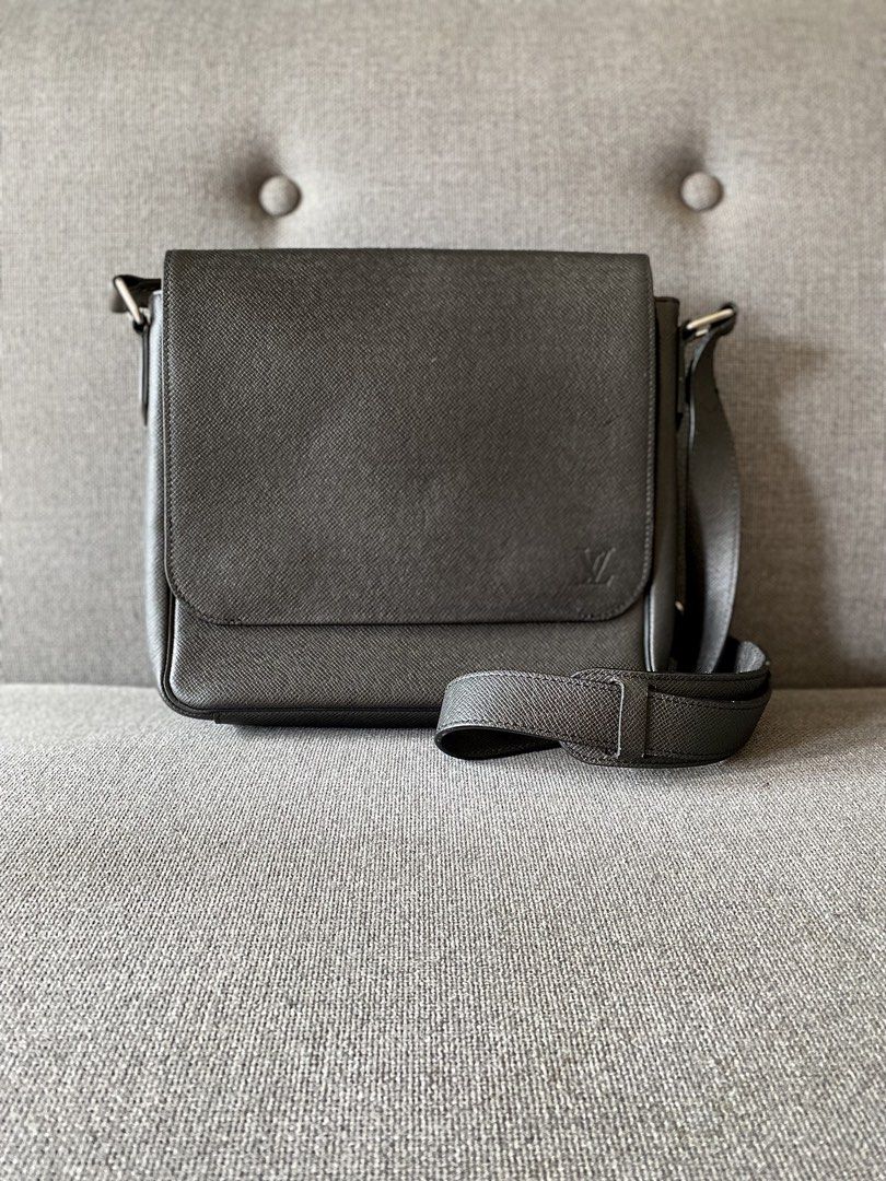 Louis Vuitton Taiga Leather Messenger Bag (Category: Luxury Bags & Wallets) located in Makati City. Submitted by robma_ (Listing ID 1450774301, Image 1). Description: Taiga Roman PM Shoulder Bag Messenger Bag Product number: 12510243. Material: Taiga leather. - Color: Black - Material: Taiga leather - Hardware: Silver - Features: Adjustable shoulder strap, main compartment, 1 exterior back zipper pocket, 1 front pocket, 1 interior zipper compartm