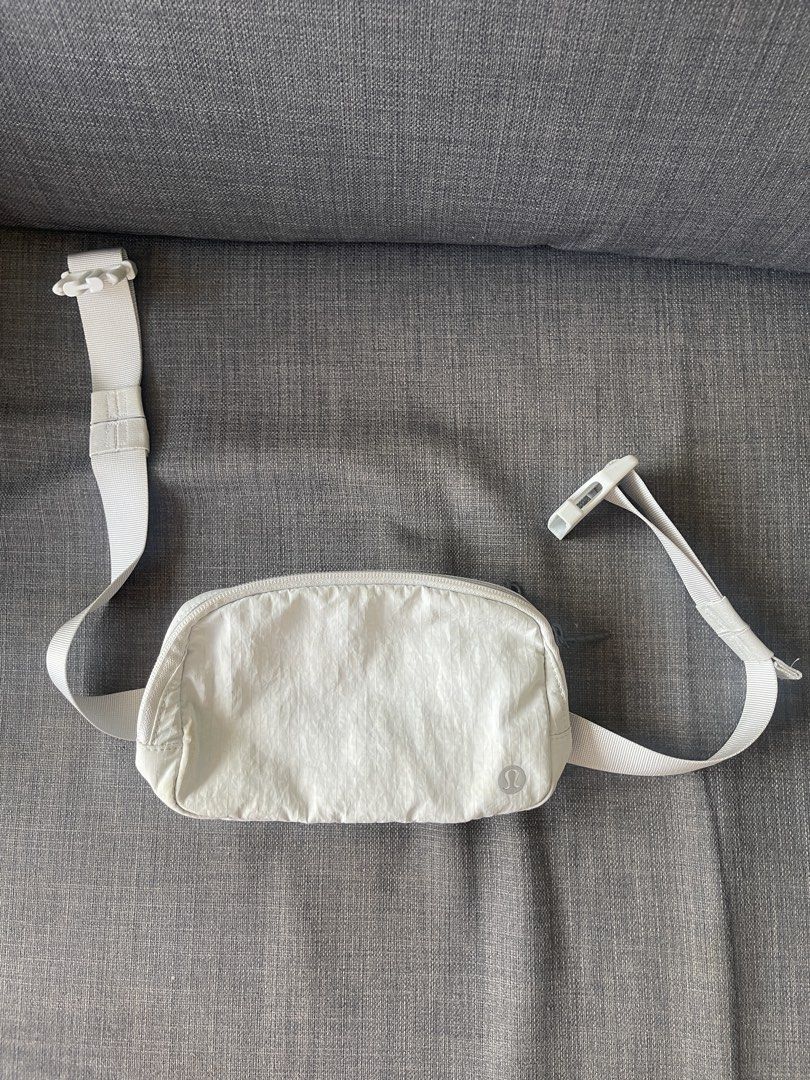 Lululemon Everywhere Belt Bag White (Category: Cross-body Bags) located in Manila. Submitted by declutterwnikki (Listing ID 1450740971, Image 1). Description: - White Lululemon Everywhere Belt Bag - Secure zipper closure - Adjustable strap for a custom fit - Interior mesh pocket for organization - Ideal for everyday wear and workouts - Made with easy-to-clean material.
