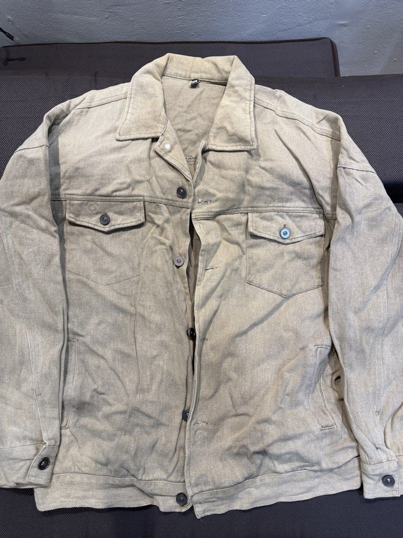 Men's Casual Button-Up Jacket Light brown (Category: Coats, Jackets and Outerwear) located in Bulacan. Submitted by surewinstuff (Listing ID 1450920999, Image 1). Description: - Classic button-up jacket - Light brown - Two chest pockets with button closure - Two side pockets - No brand - L: 25 x W: 28 inches.