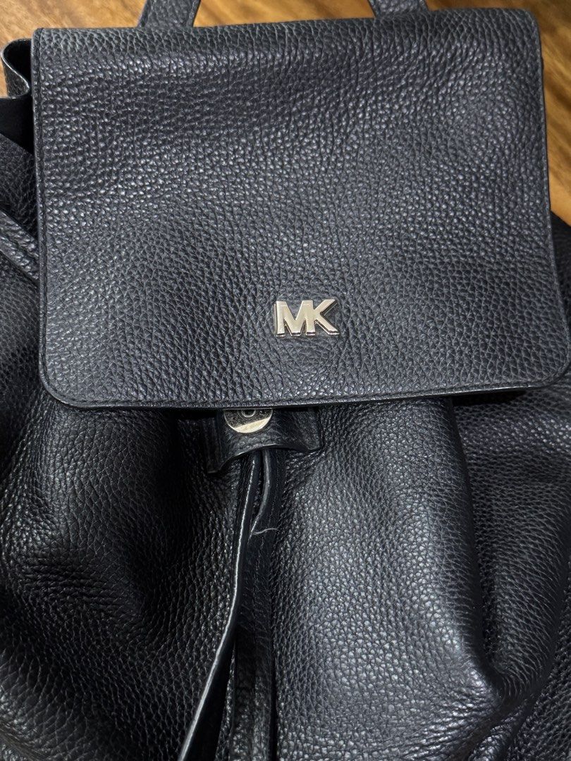 Michael Kors Black Pebbled Leather Backpack (Category: Backpacks) located in Koronadal. Submitted by hiddencloset_2023 (Listing ID 1450854007, Image 2). Description: Authentic Michael Kors Backpack • Black pebbled leather • Gold-tone MK logo hardware • Drawstring with magnetic flap closure • Adjustable backpack straps • Spacious interior for everyday essentials • Lightweight and stylish • Great for work, school, travel, or casual use.