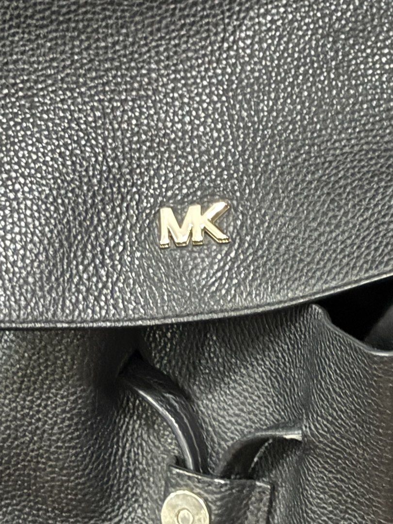 Michael Kors Black Pebbled Leather Backpack (Category: Backpacks) located in Koronadal. Submitted by hiddencloset_2023 (Listing ID 1450854007, Image 3). Description: Authentic Michael Kors Backpack • Black pebbled leather • Gold-tone MK logo hardware • Drawstring with magnetic flap closure • Adjustable backpack straps • Spacious interior for everyday essentials • Lightweight and stylish • Great for work, school, travel, or casual use.