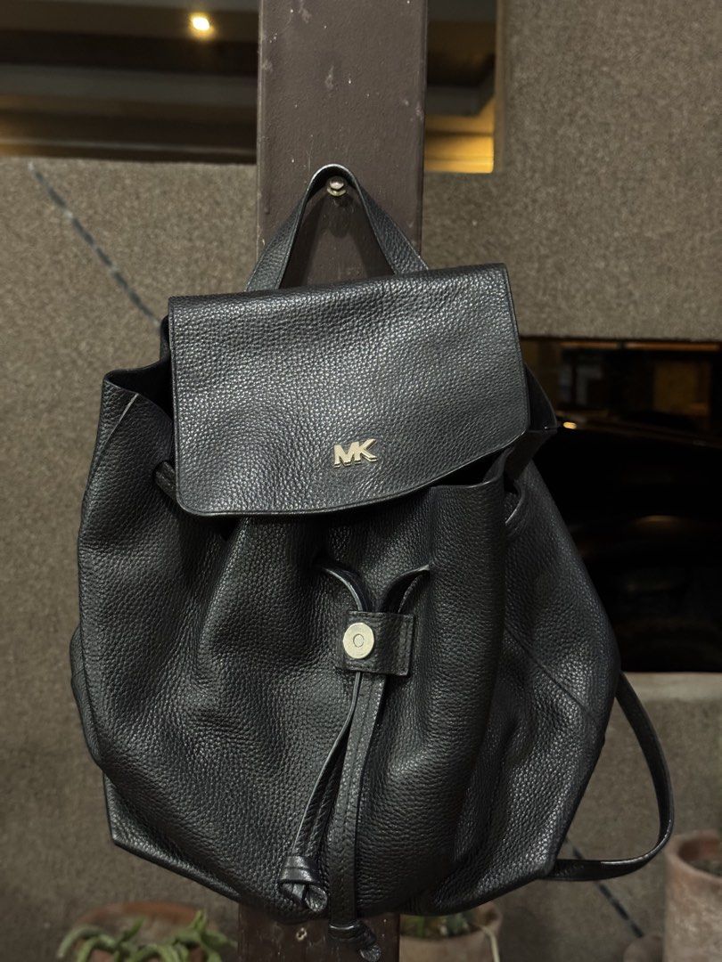 Michael Kors Black Pebbled Leather Backpack (Category: Backpacks) located in Koronadal. Submitted by hiddencloset_2023 (Listing ID 1450854007, Image 1). Description: Authentic Michael Kors Backpack • Black pebbled leather • Gold-tone MK logo hardware • Drawstring with magnetic flap closure • Adjustable backpack straps • Spacious interior for everyday essentials • Lightweight and stylish • Great for work, school, travel, or casual use.