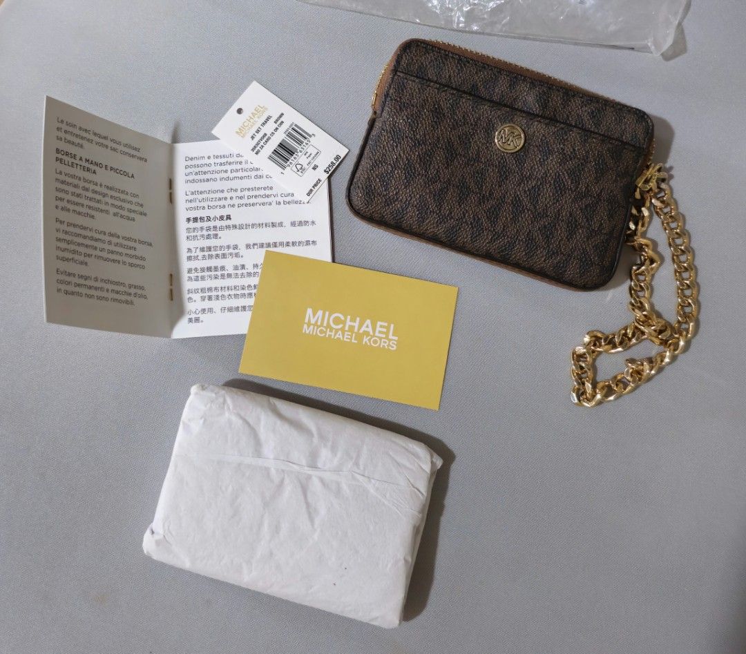 Michael Kors Card Holder (Category: Luxury Bags & Wallets) located in Baguio. Submitted by catdeclutters (Listing ID 1450802938, Image 2). Description: Original, still with tags Last price + 65 sf j&t.