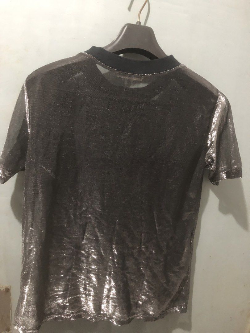 BUNDLE SALE!!!! 2 ELEGANT MANGO BLOUSES FOR ONLY 999 (Category: Sleeveless) located in Quezon City. Submitted by unique2shop (Listing ID 1450815211, Image 2). Description: - MNG Suit Top - Sparkly sheer material with gold flecks - Short sleeves - Mock neck - Estimated size: S/XS - Made in Romania.