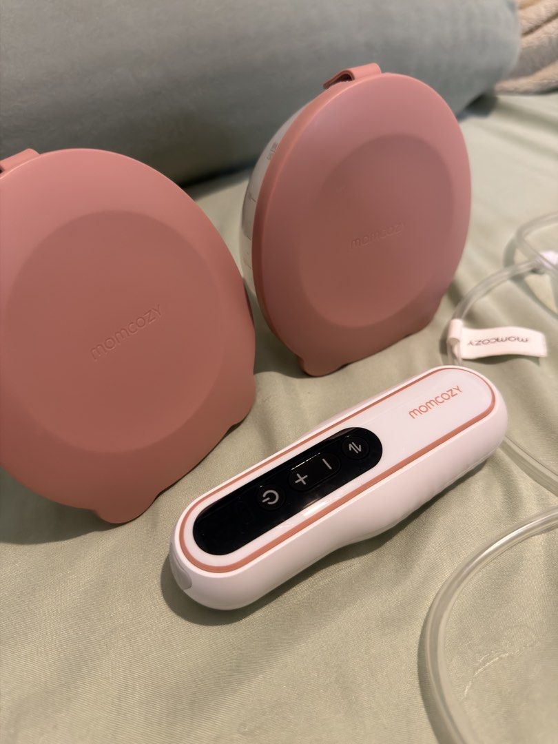 Momcozy V2Pro Wearable Breast Pump Set (Category: Breastfeeding & Bottle Feeding) located in Paranaque City. Submitted by alyysa.chr (Listing ID 1450894716, Image 2). Description: - Momcozy wearable breast pump set - Includes 2 pumps, tubing, and controller - Comes with Dapple Baby breast pump wipes - Ideal for convenient, on-the-go pumping - Easy to use and clean Will give additional breastpump wipes bought from amazon for free.