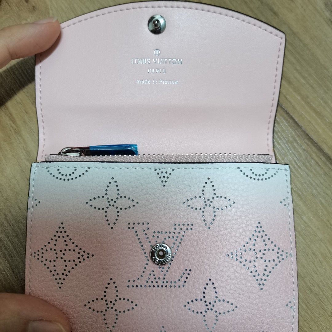 Monogram Perforated Pink Wallet (Category: Wallets & Card holders) located in Kajang. Submitted by estee_st (Listing ID 1450737381, Image 3). Description: - Pink L. V Wallet - Classic Monogram Pattern with Perforations - Secure Snap Button Closure - Interior Zipped Compartment - Multiple Card Slots - Made in France.