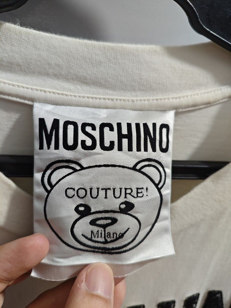 Moschino Toy Bear Unisex Tshirt (Category: Shirts) located in Baguio. Submitted by jayjay_apparel01 (Listing ID 1450897172, Image 2). Description: Moschino Toy Bear Unisex Tshirt Color Rate 9.5/10 No Flaws Complete Tags Patch And Embroidered Design Makapal Tela Cotton Machine Washed Size Large Dimes 20 Width 27 Length Price P359.