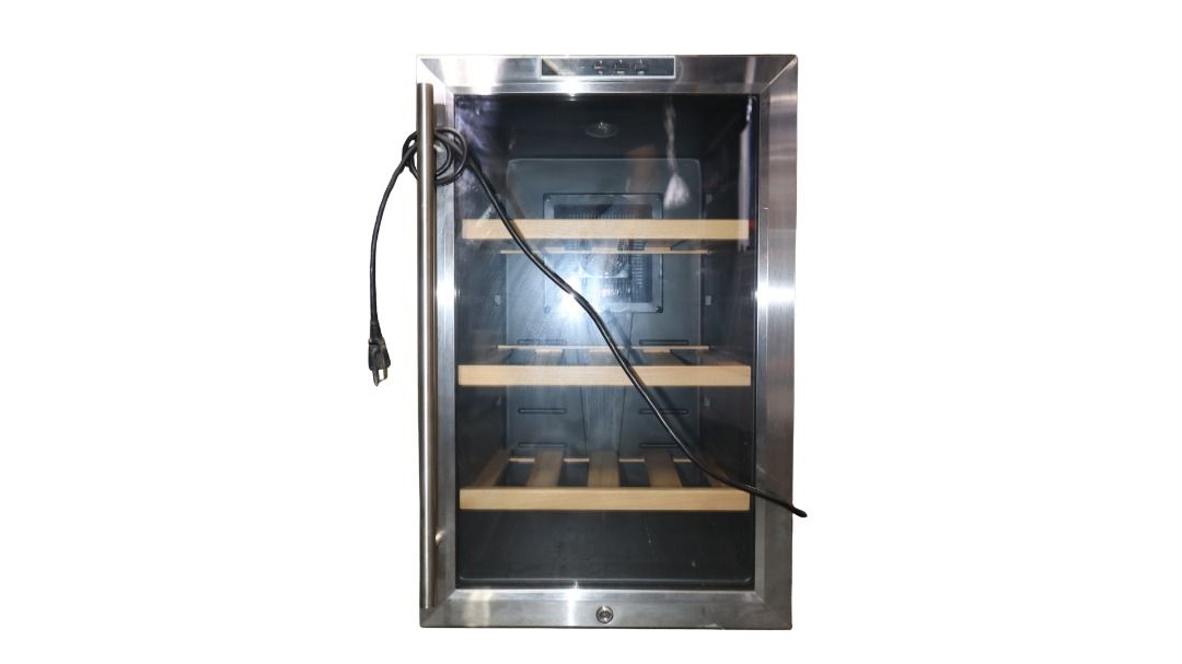 Muller & Stein Wine Chiller MFWC - 28B (Category: Wine Cellar & Storage) located in Caloocan City. Submitted by mce_sales2026 (Listing ID 1450813497, Image 1). Description: Details: Muller & Stein Wine Chiller (Model: MFWC-28B), a compact and stylish wine storage unit designed to keep wines at optimal temperature. Ideal for home use, small collections, or office settings, with space for multiple bottles. Features: - Capacity for up to 28 bottles 