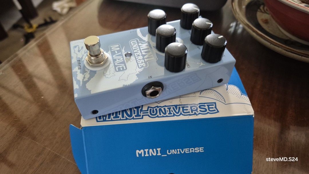 M-WAVE Mini Universe Guitar Effect Pedal (Category: Musical Instruments) located in Bantay. Submitted by backyardcyclist (Listing ID 1450778580, Image 1). Description: - M-WAVE Mini Universe reverb effect pedal - Eye-catching light blue color with fun graphics - Features 6 knobs for versatile sound shaping - Includes original box - Ideal for guitarists seeking new sonic possibilities.
