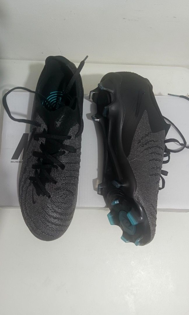 Nike Phantom GX 2 Elite FG (Category: Sneakers) located in Tacurong. Submitted by thegraphiteman (Listing ID 1450858813, Image 3). Description: Brand: Nike Model: Nike Phantom GX 2 Elite FG Size: UK 6 / 24.5 cm / EUR 39 Condition: Excellent Condition RFS: Wrong Size I only wore it once to try the fit and never used it for playing. It has never been used outdoors. 📍Meet-up ( DVO City ) or shipping available. 💬 Feel free to message me if you have